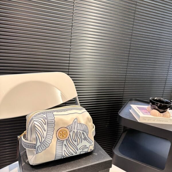 TB Mini makeup bag by , an absolutely trendy