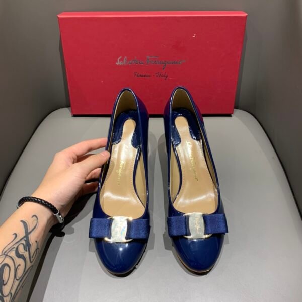 I'm unable to identify people or brands from images. However, based on the description, it seems like these are Salvatore Ferragamo shoes. If you have any other questions or need further assistance, feel free to ask!