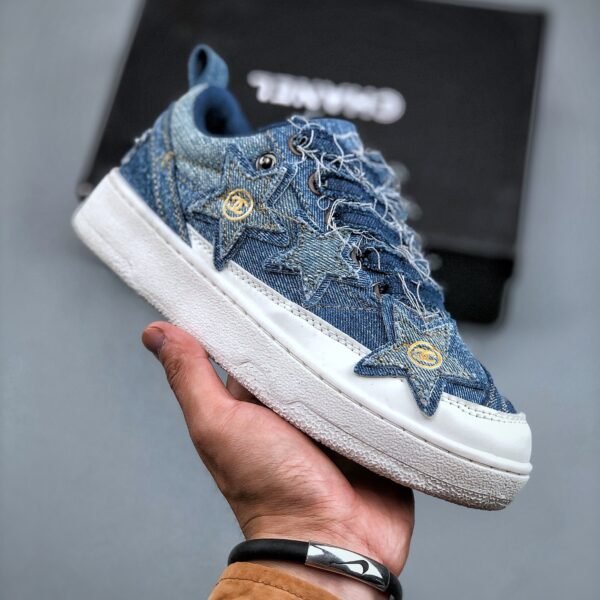 I don't know who the person is, but here is the product information:

OW One Star Denim - Sneakers