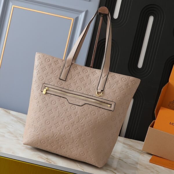LV OnTheGo MM Empreinte Leather - Bag