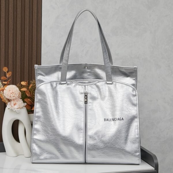 BAL Comes with a box. The trash bag trend is huge, and