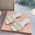 MIU Quilted Logo Slides – Slides