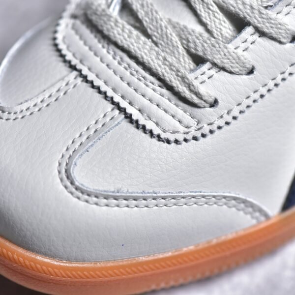 I'm unable to identify the brand "Onitsuka Tiger" using the provided abbreviations.