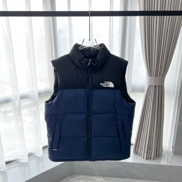 ```plaintext
TNF Nuptse Vest - Vest
```