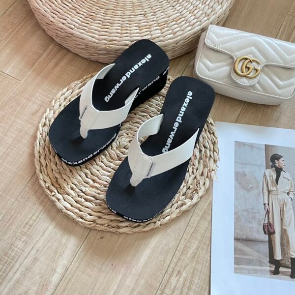 ```BAL Logo Flip Flops Black/White - Sandals```