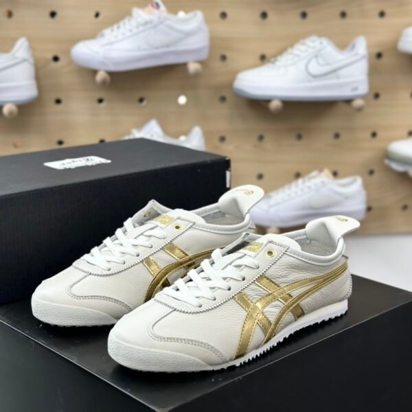 ```
NK Mexico 66 White/Gold - Sneakers
```