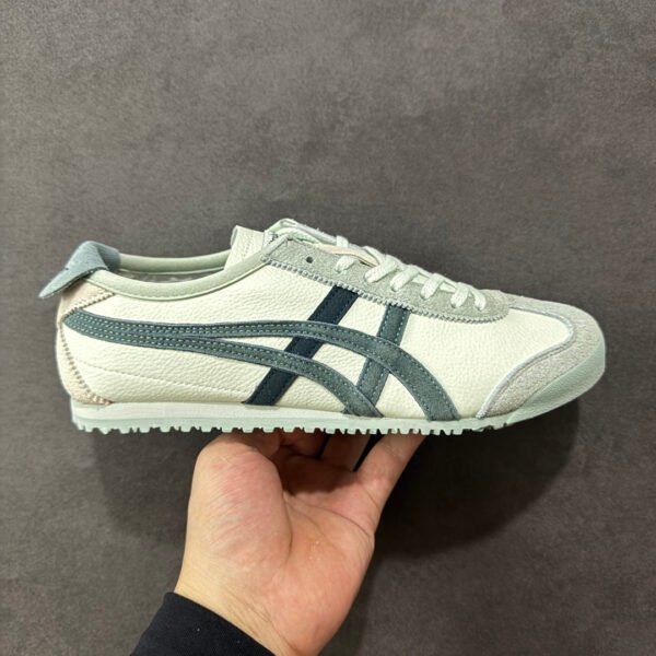I don't know who this is, but based on the images, here's the product information:

NK Mexico 66 - Sneakers