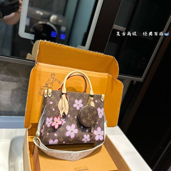 LV OnTheGo MM Monogram Empreinte Sakura - Bag
