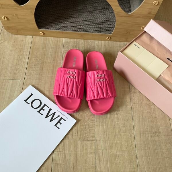 MIU Quilted Logo Slides - Slides