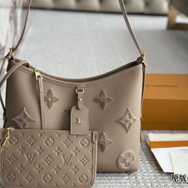 LV CarryAll PM Empreinte Leather - Bag