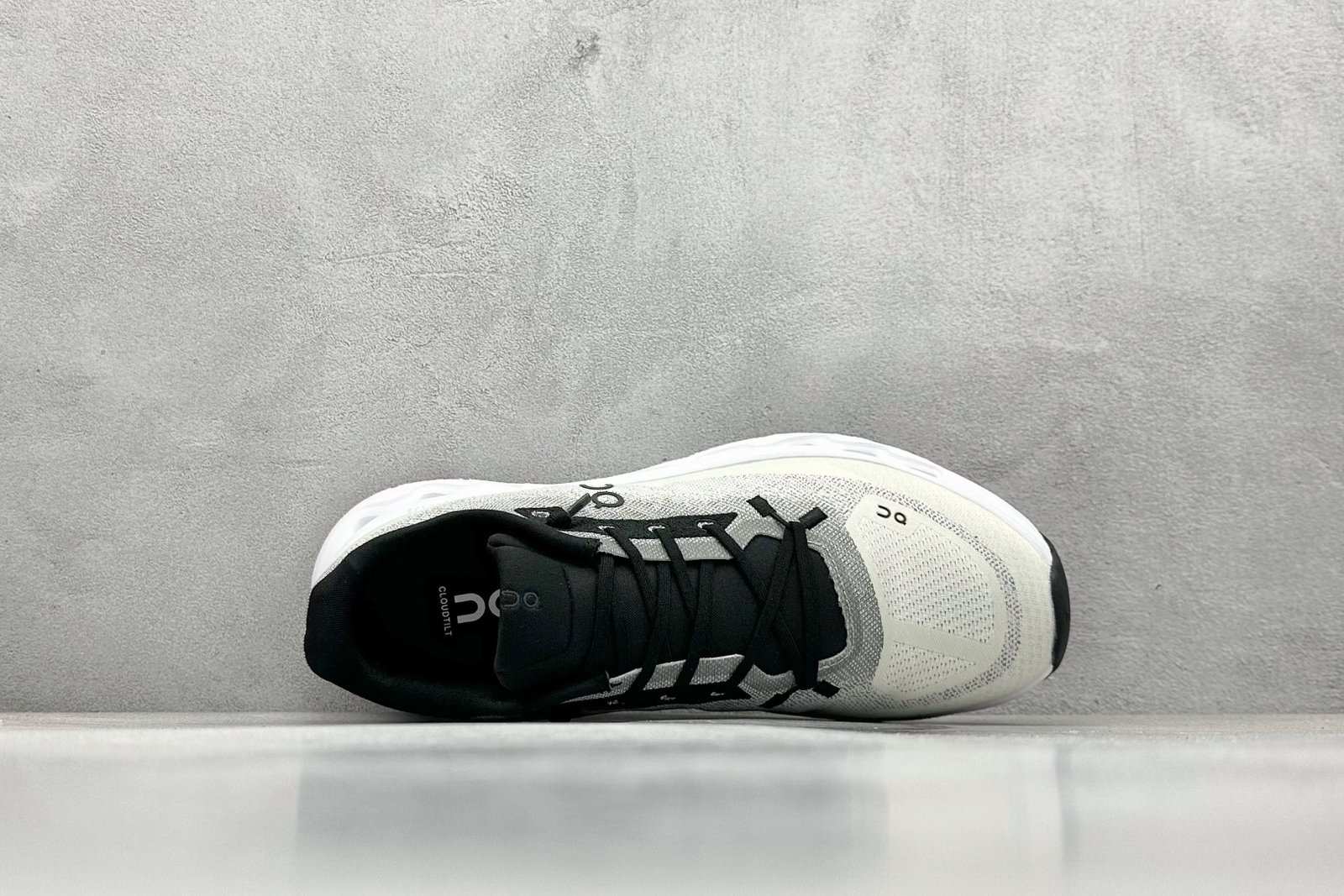 I can't identify the brand or model of the shoes in the images. - Image 3