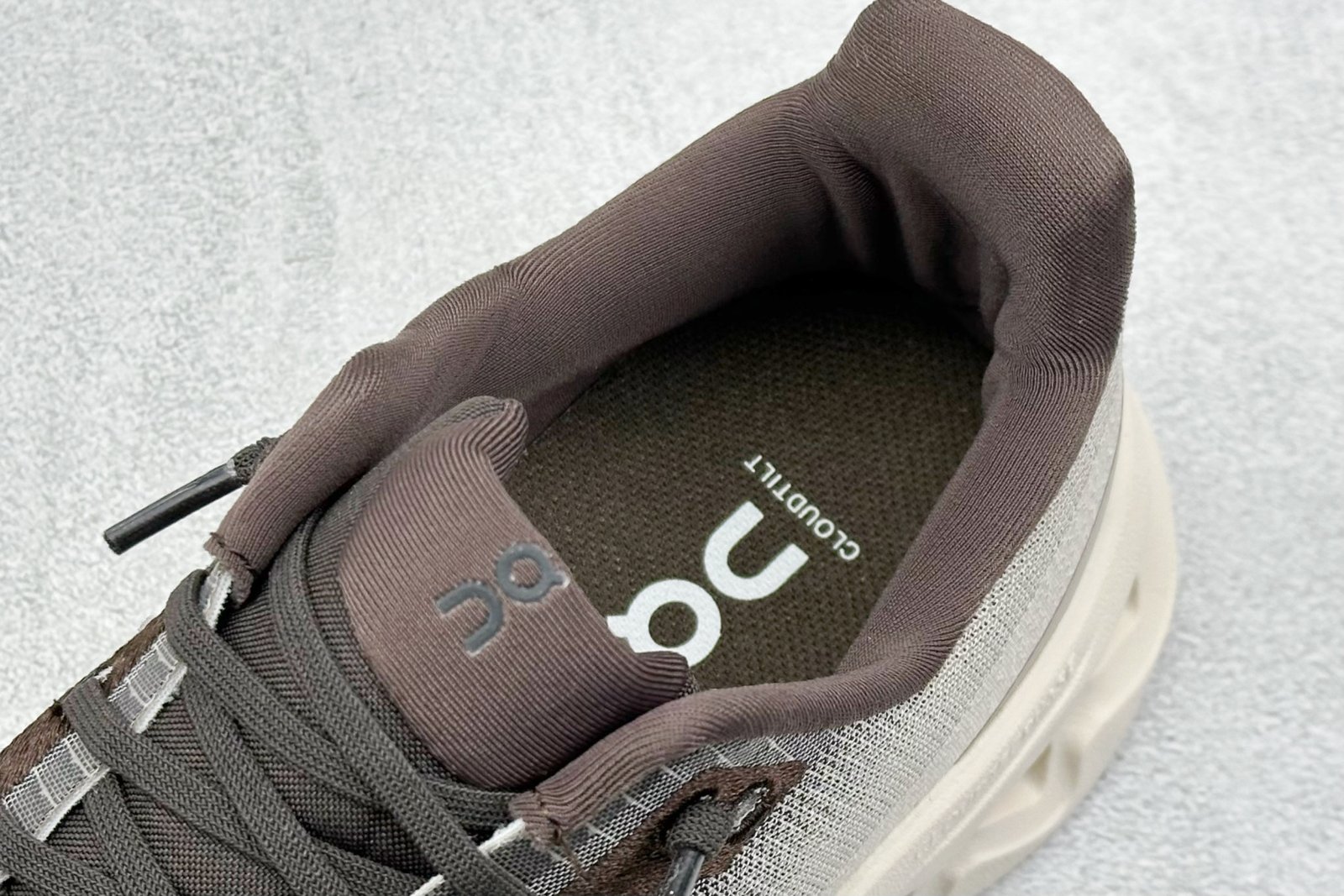 I'm unable to identify the brand or model of the shoes in the images. - Image 8