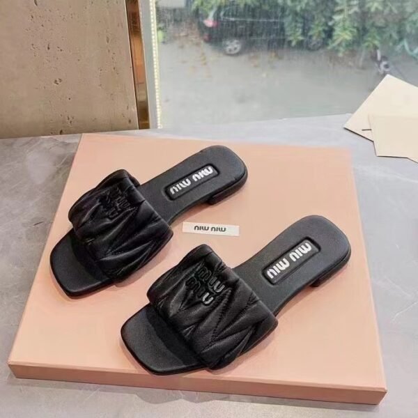 MIU Quilted Logo Slides - Slides