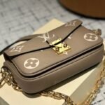 LV Pochette Metis Monogram Empreinte – Borsa – Oro