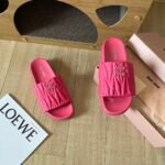 MIU Quilted Logo Slides – Slides
